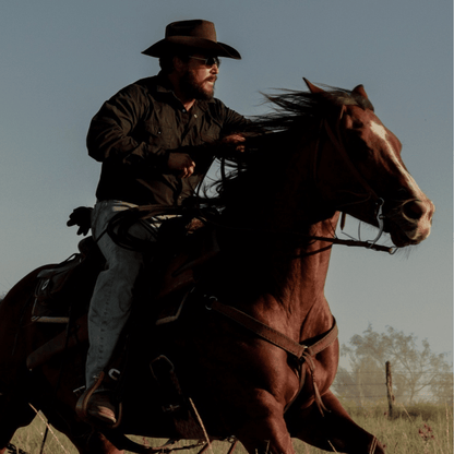 Cola Hauser from Dutton Ranch on horse with Oliver Peoples Clifton Sunglasses