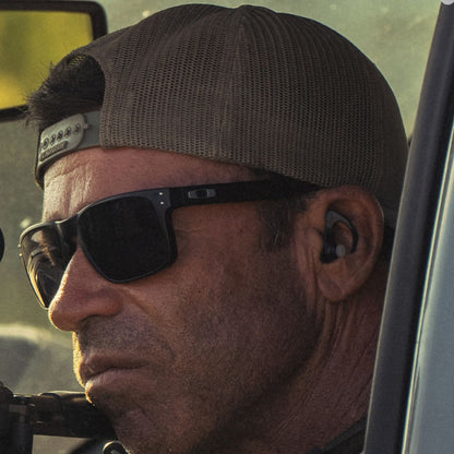 Taylor Sheridan wearing Oakley Holbrook in Lioness