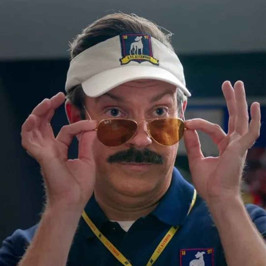 Ted Lasso wearing the RayBan 3025