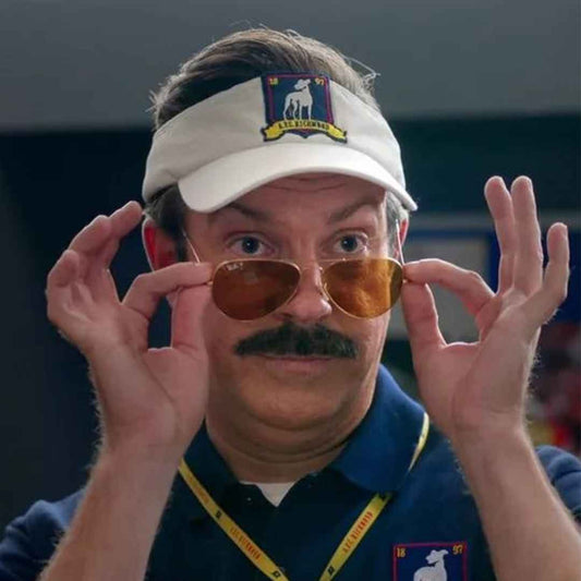 Ted Lasso wearing the RayBan 3025